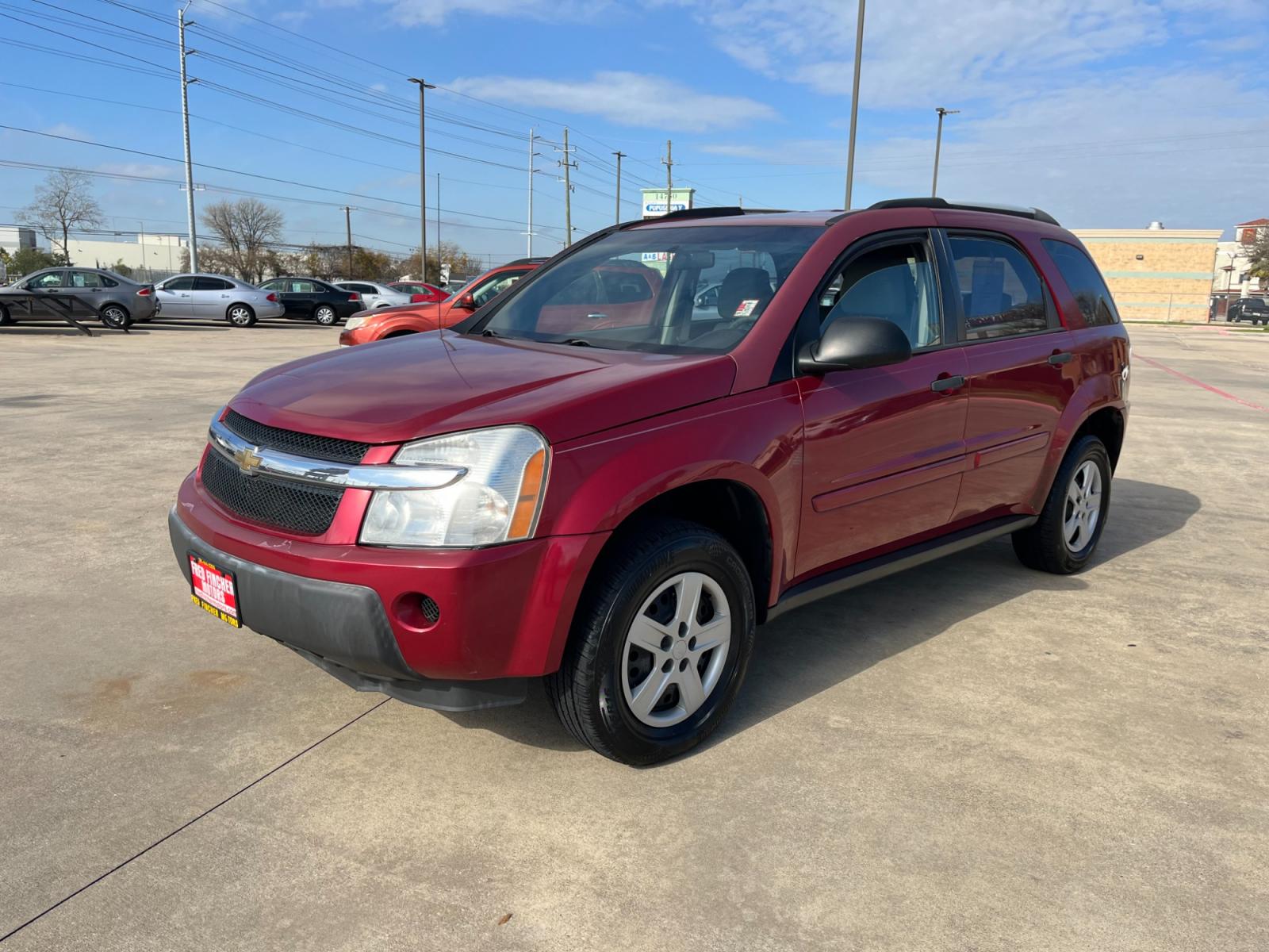 2006 red /TAN Chevrolet Equinox LS 2WD (2CNDL13F366) with an 3.4L V6 OHV 12V engine, 5-Speed Automatic transmission, located at 14700 Tomball Parkway 249, Houston, TX, 77086, (281) 444-2200, 29.928619, -95.504074 - Photo #2